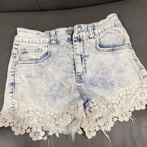 Refuge light blue denim high-waisted jean shorts with lace bottom. Size 0/short.